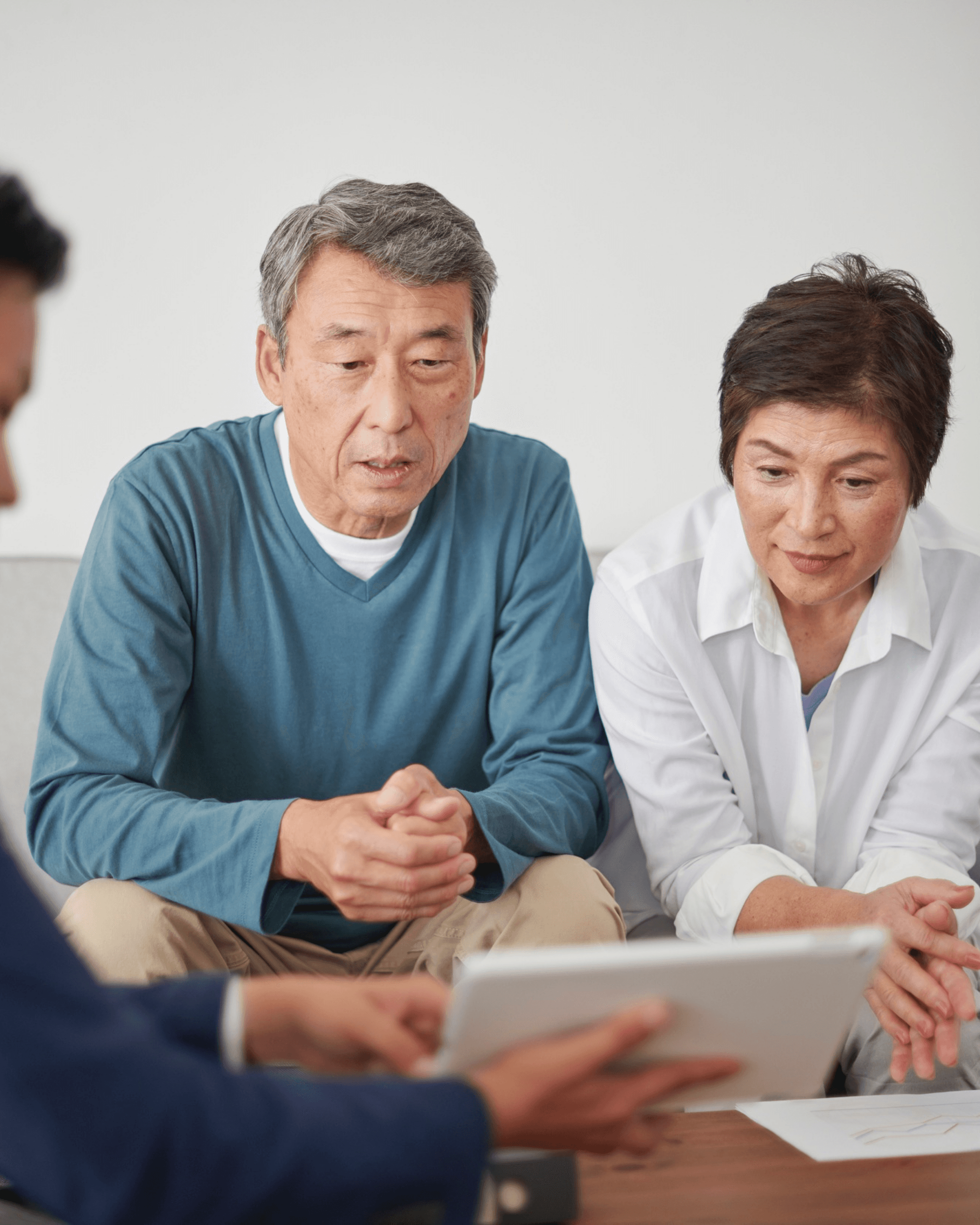 Advisor discussing benefits with clients